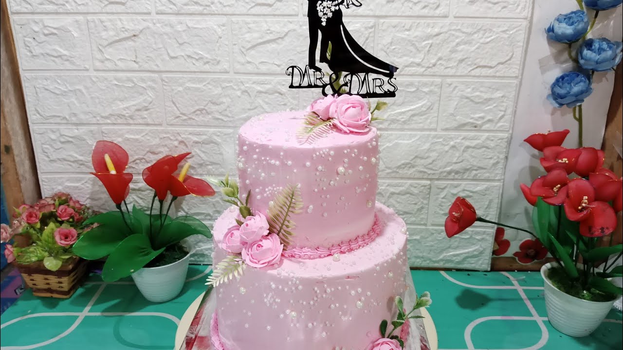 Wedding cake 2 tingkat pink mutiara