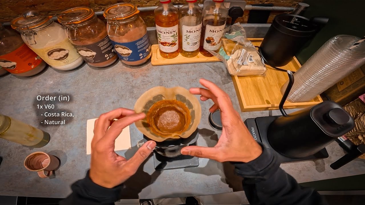 POV - Barista works at a speciality coffee shop