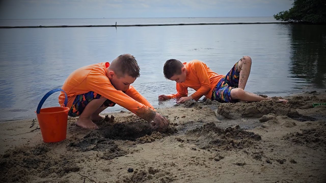 Kids Playing at the Beach at Maya Key Private Island Retreat in Roatan Honduras