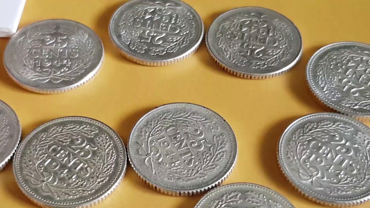 Dutch silver quarters. Great condition on the almost 75 year old coins
