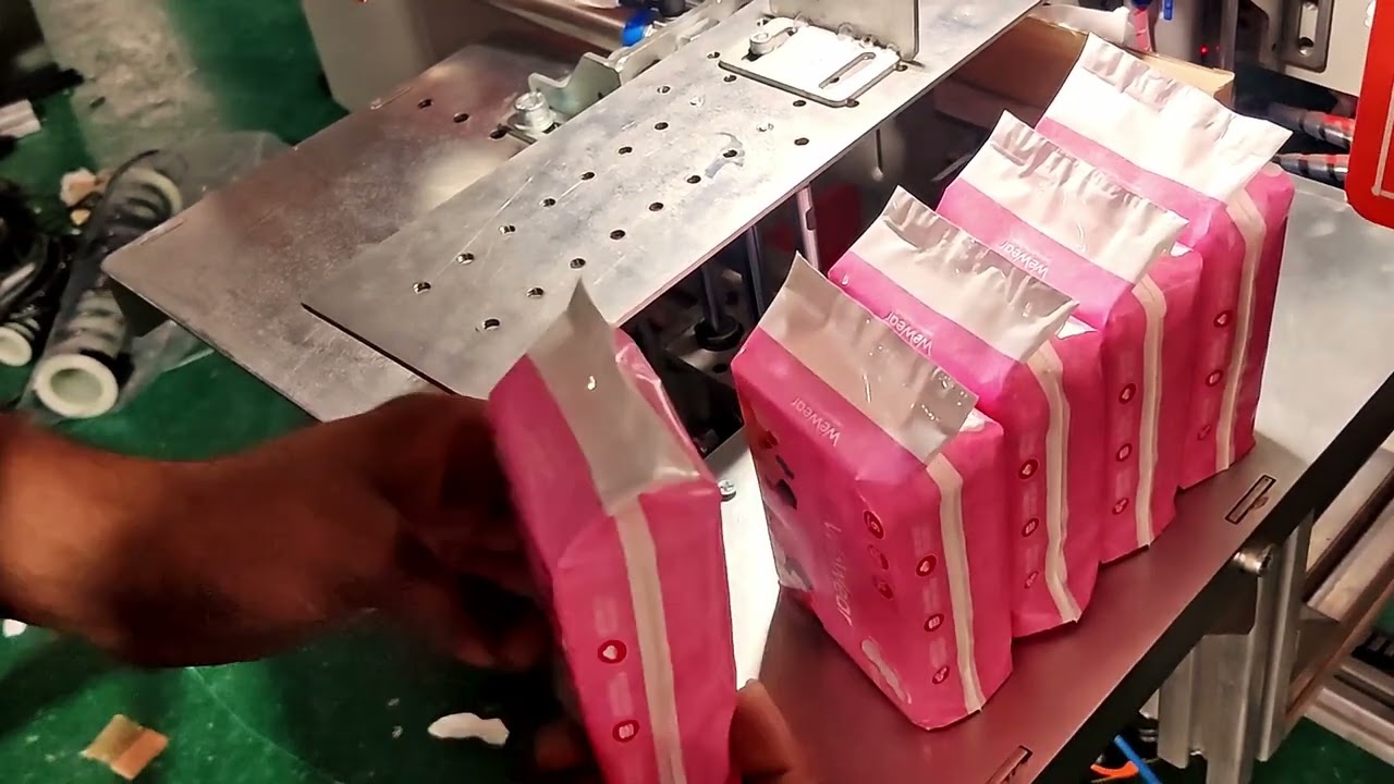Semi - Automatic Sanitary Napkin Packing Machine (Conveyor & Covered Type)