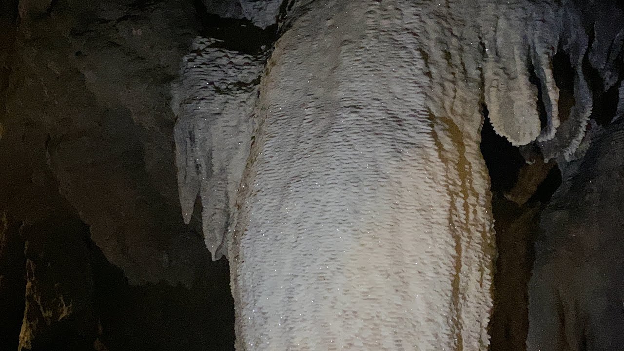Boat ride through Toi Cave, the longest (320 m) in Trang An Complex, a UNESCO World Heritage site.