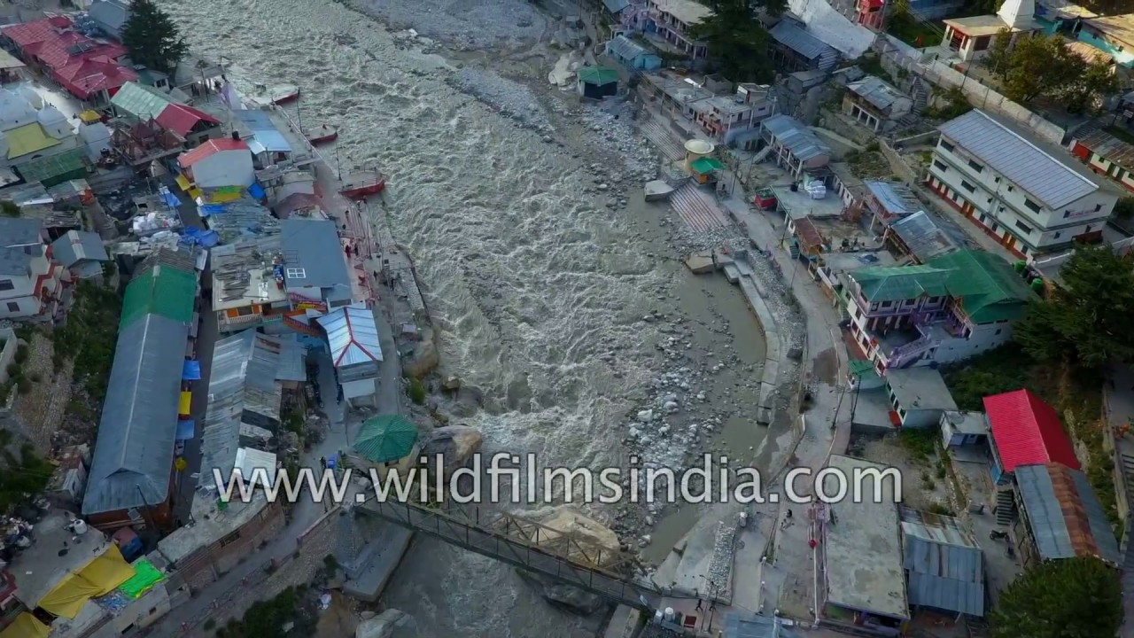 Gangotri town - the famous temple, a cluster of shops and the Ganges coming in from Gaumukh