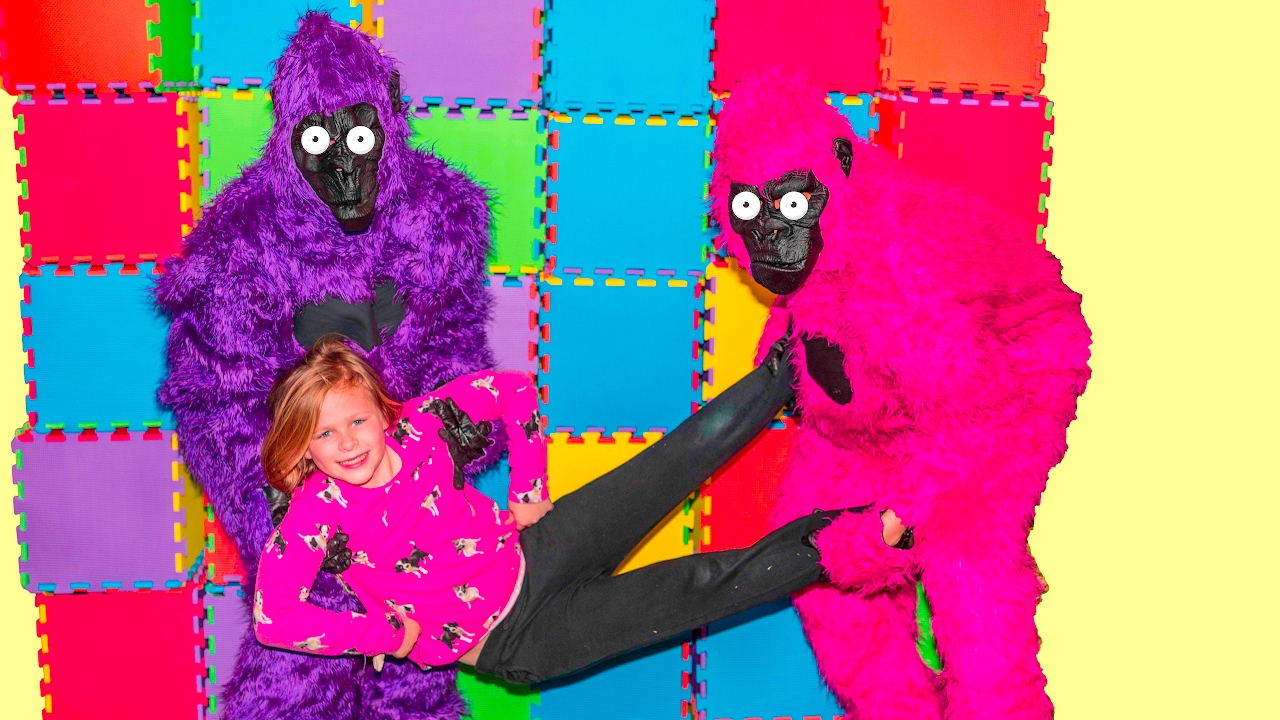 Gorillas Escape and Play with the Assistant in Her Bounce House