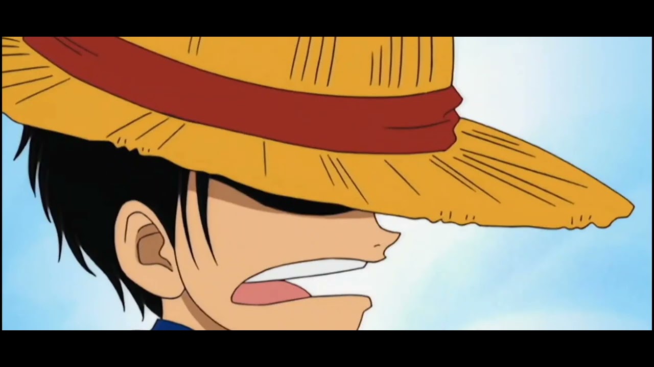 Shanks dona il suo cappello di paglia a Luffy. One Piece