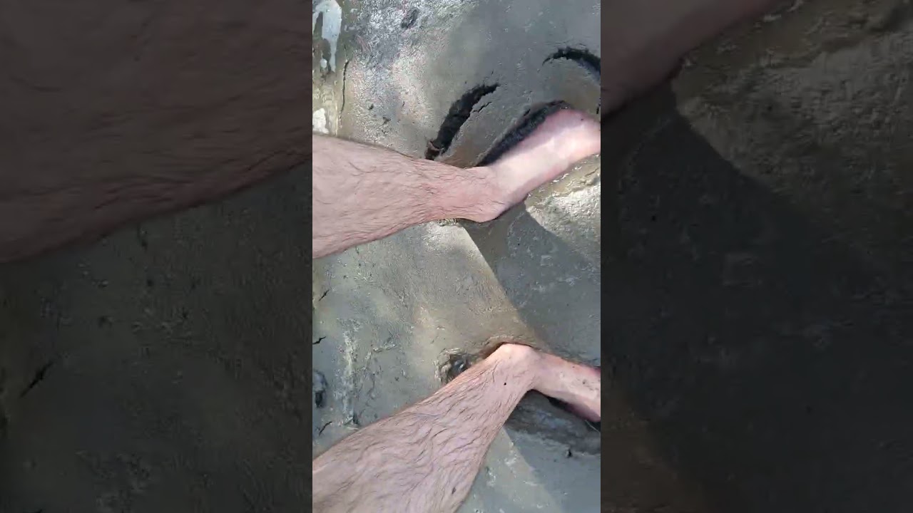 Walking along the river barefoot