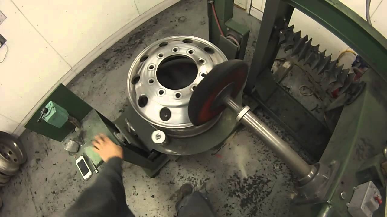 Evan's Detailing and Polishing doing aluminum front Semi Wheel