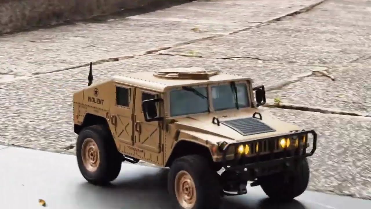 Four-wheel drive remote-controlled Hummer SUV conquers all terrains, from sandy beaches to muddy 