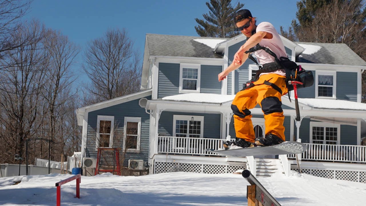 Rebuilding the front yard snowpark for some spring snowboarding!