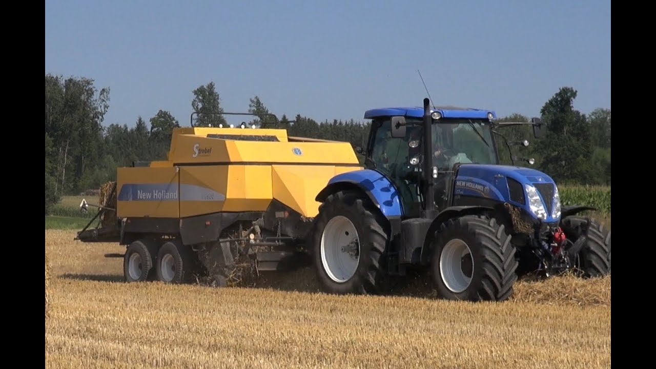 Traktor New Holland T7 und New Holland BB960 im Ernteeinsatz-Baling Ballenpresse-Super Wednesday