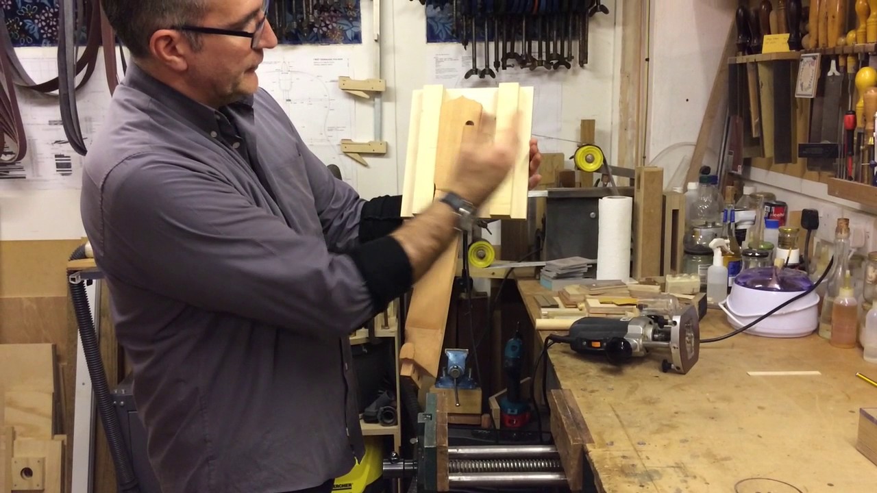 How to cut the string slots on the head of a Spanish guitar