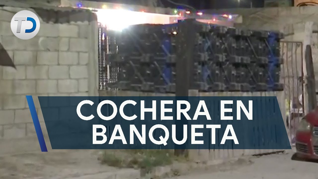 Denuncian vivienda con cochera en plena banqueta