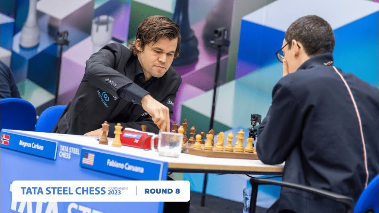 Carlsen over comes Caruana Spearheads day of four victories Tata Steel Chess Tournament 