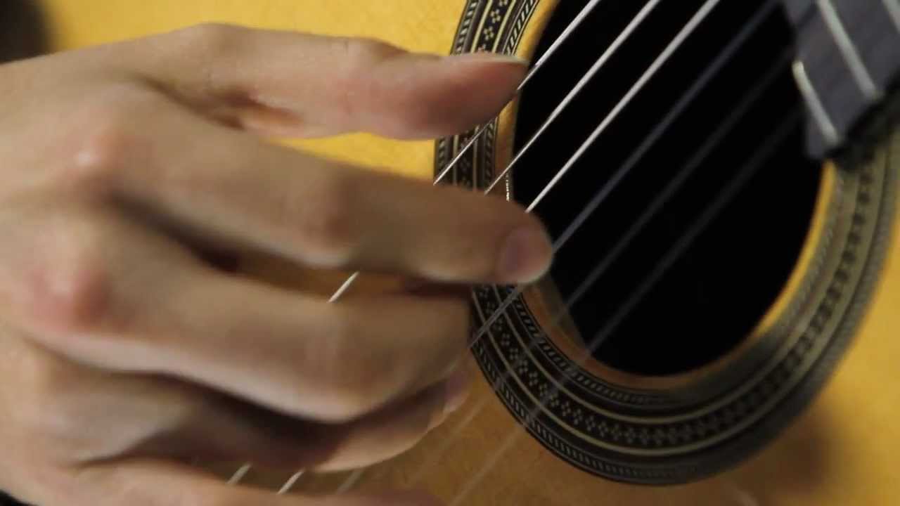 Guitar Lesson: How to Play a Free Stroke with Good Tone