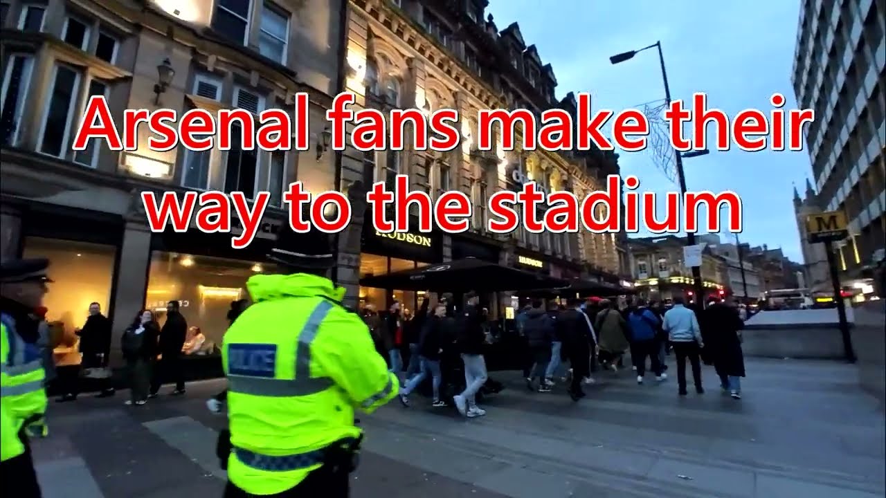 Arsenal fans drinking and singing in Newcastle 04/11/23 before making their way to St James Park.