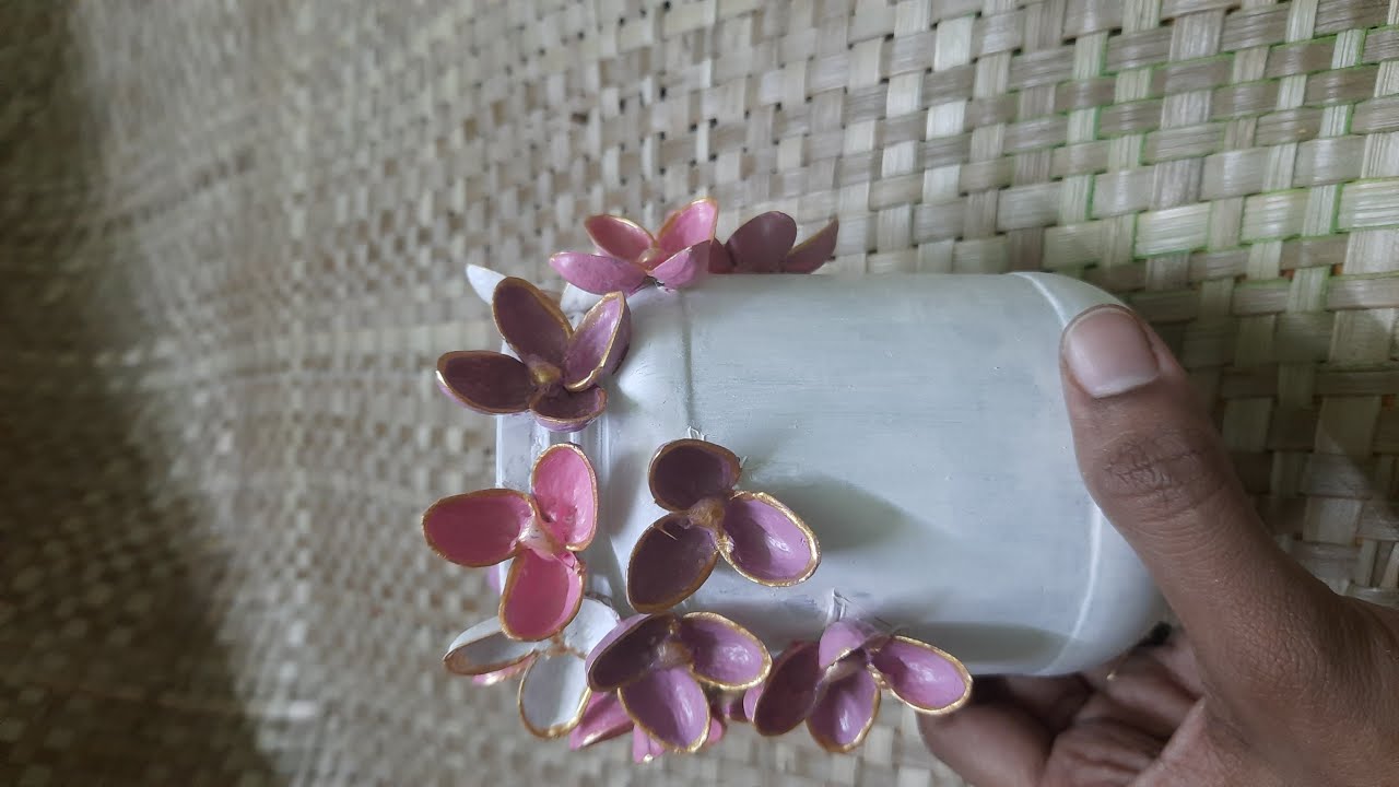 Bottle art using  pista shellDiy vase
