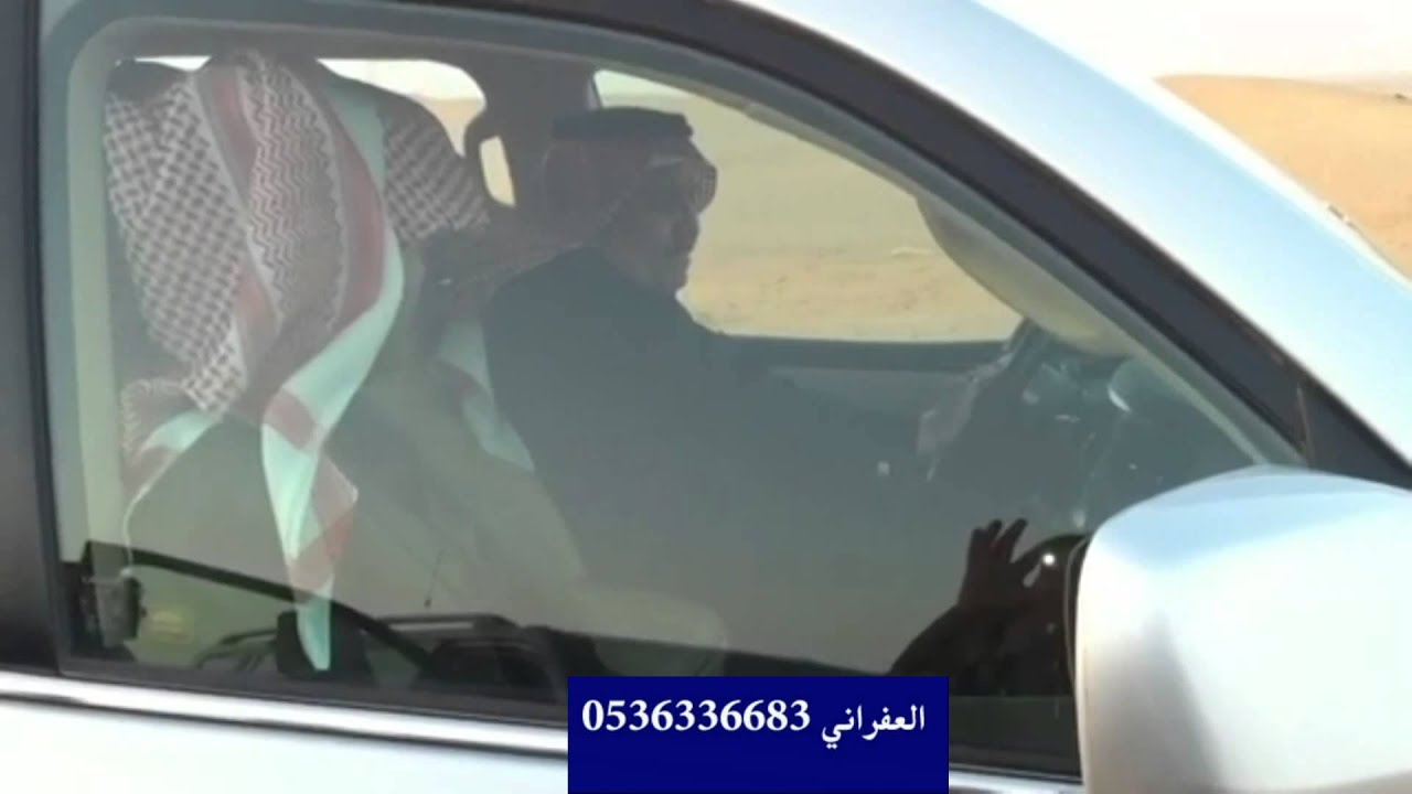 الامير نايف يقود سيارته عند الابل في البر وعلى يمينه نجله الامير فهد تصوير خاص وحصري للعفراني