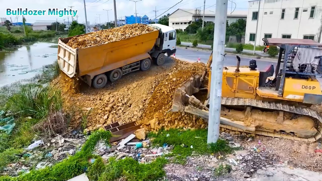 Wonderful Bulldozer KOMATSU D31P​ Working, Dump Truck unloading, Filling Up The Land huge