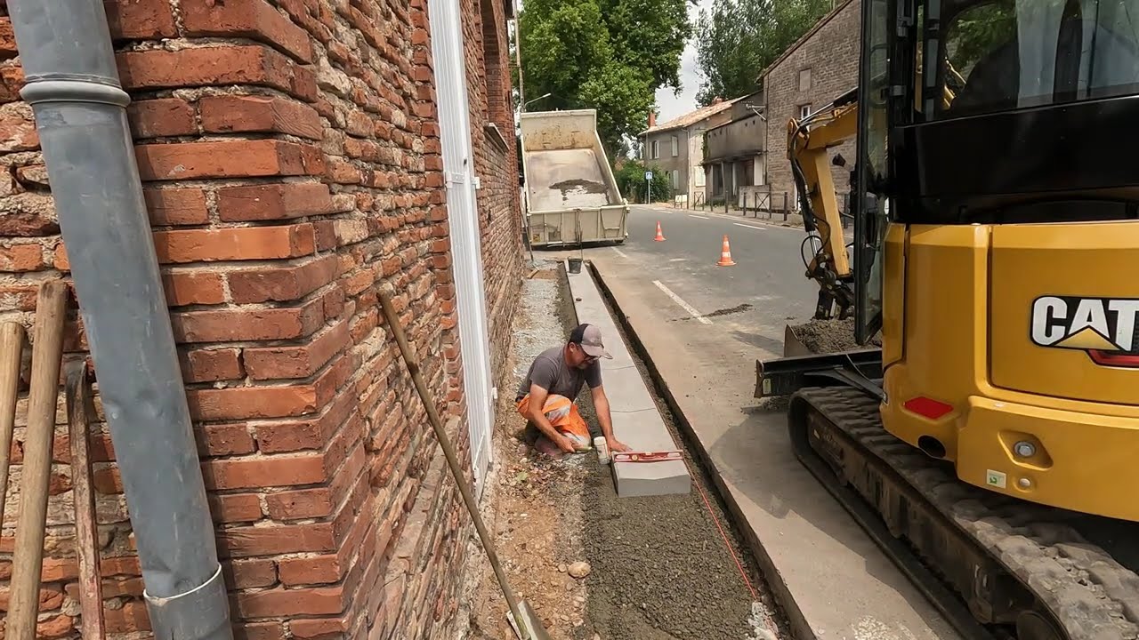 Pose de bordure caniveau .