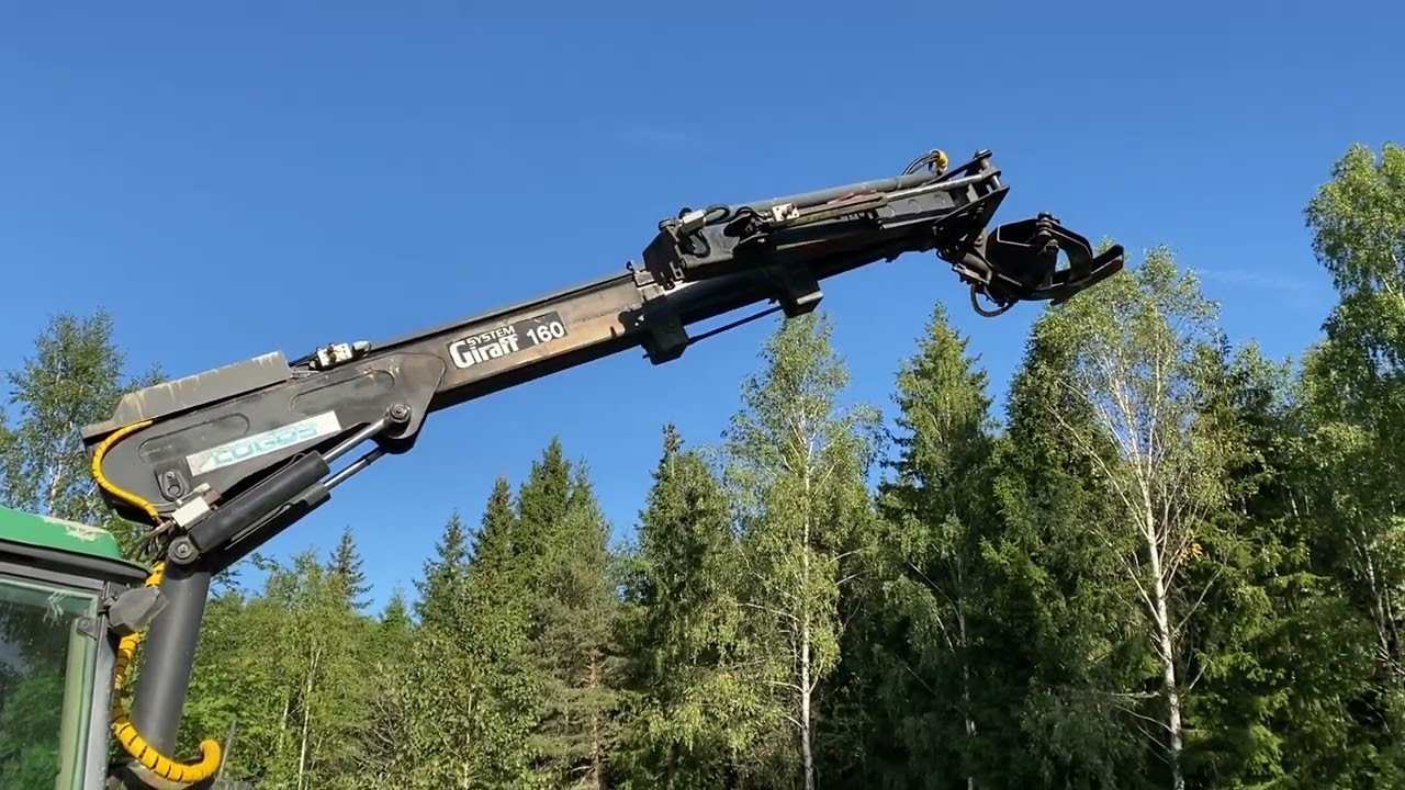 John Deere 3650 med kran