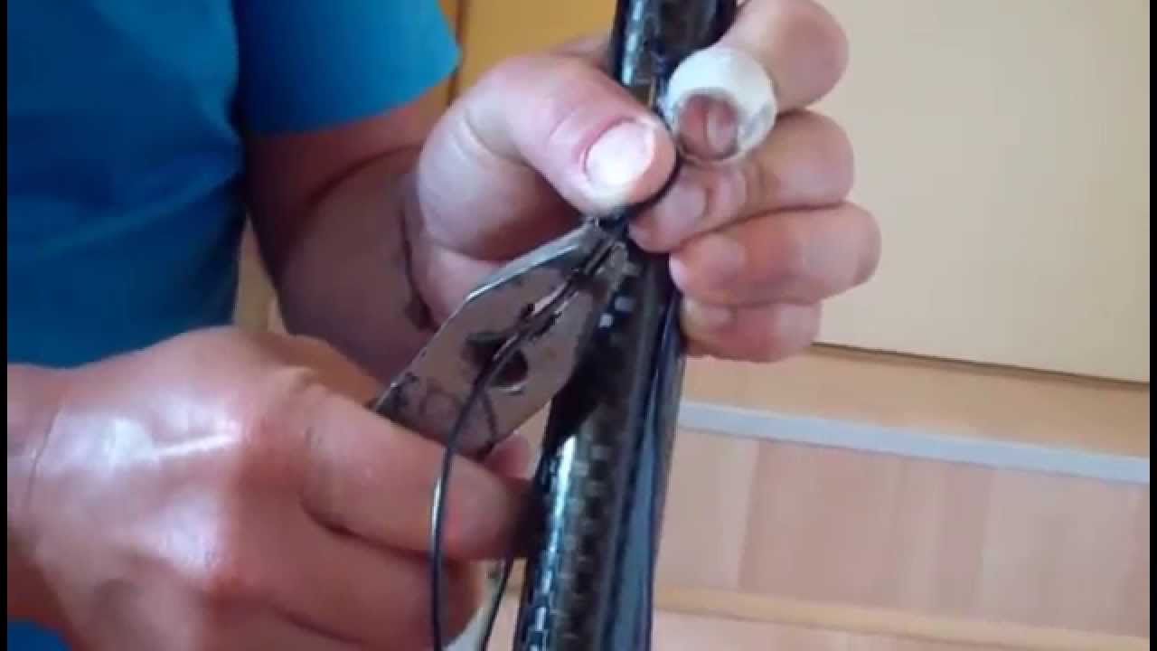FIXATION DU MOULINET ET RACCORD DE LA FLECHE SUR LE FUSIL HARPON