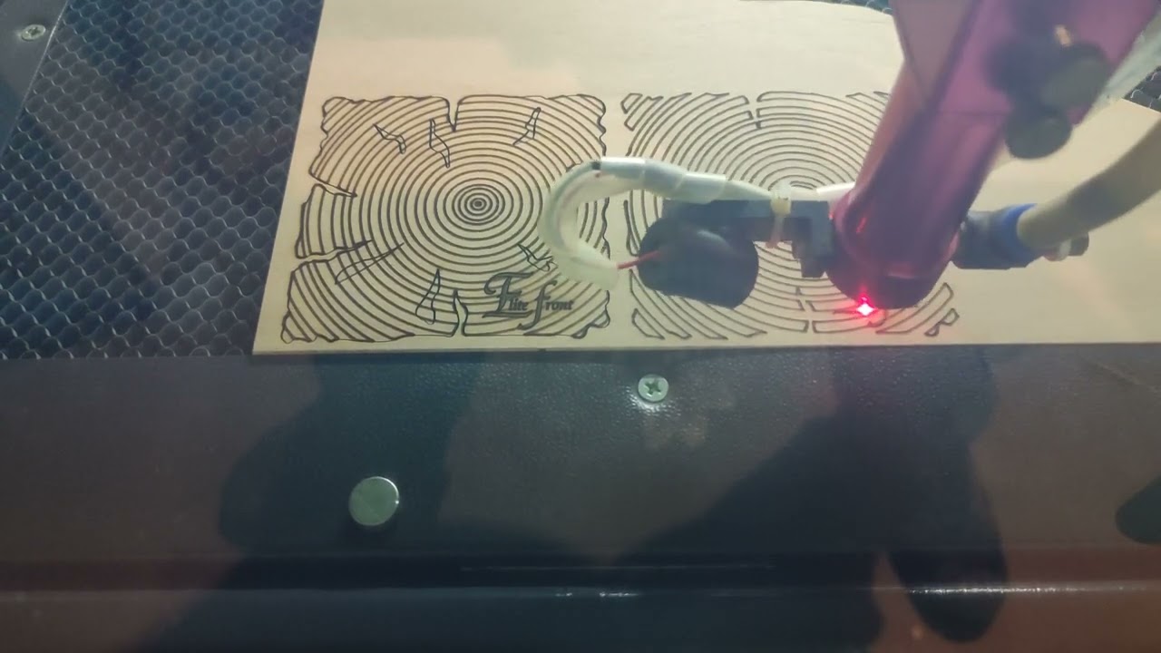 Coaster focus shift engraved and cut with a co2 laser from 4mm beech plywood