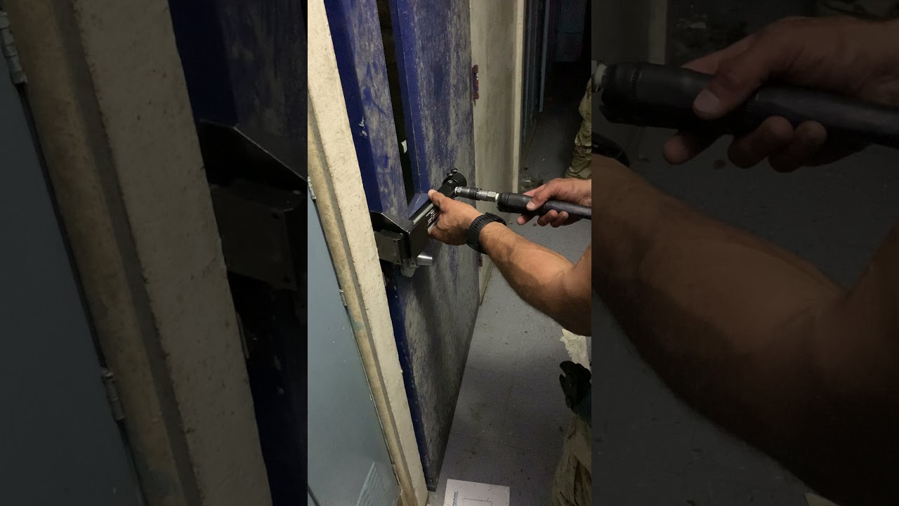 HDP4 Door Pusher (Rabbit Tool) - On Outward Opening, Steel, Solid Core Door w/ Concrete Metal Frame