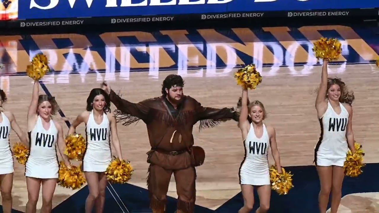 WVU Mountaineerwith the WVU Dance Team