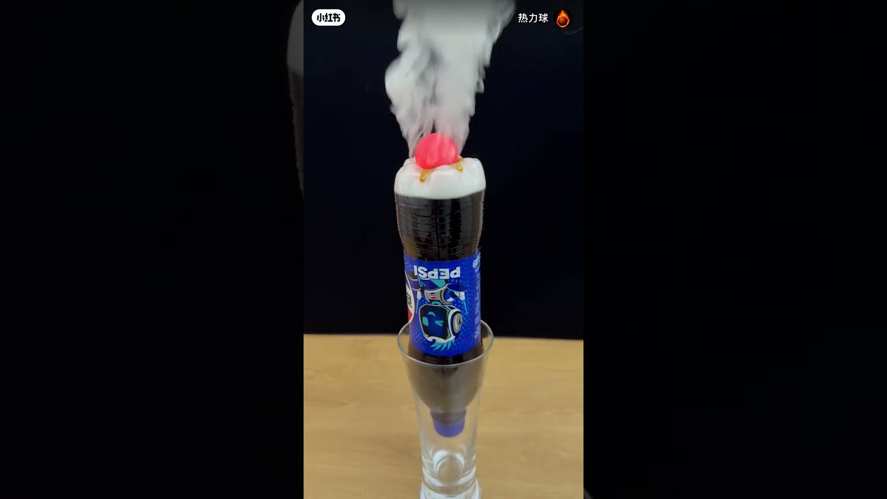 Satisfying Red Hot Ball burns Pepsi bottle 