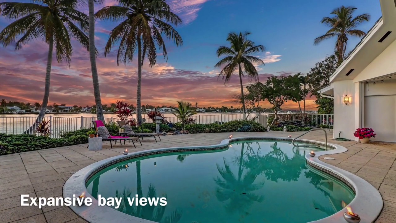 Luxury waterfront home in Naples, Florida, boating, yachting, dolphins on .4 acres and 133 feet.