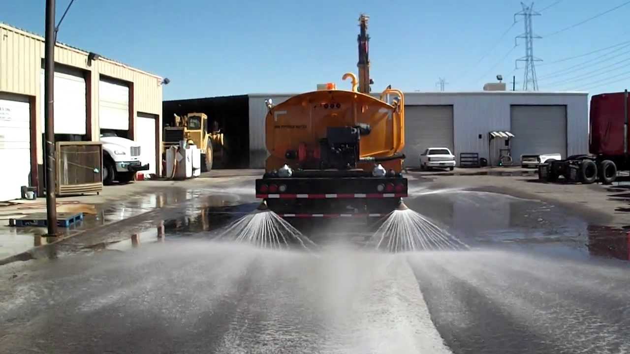 Truck Works, Inc. Water Truck in Action - Street Flusher