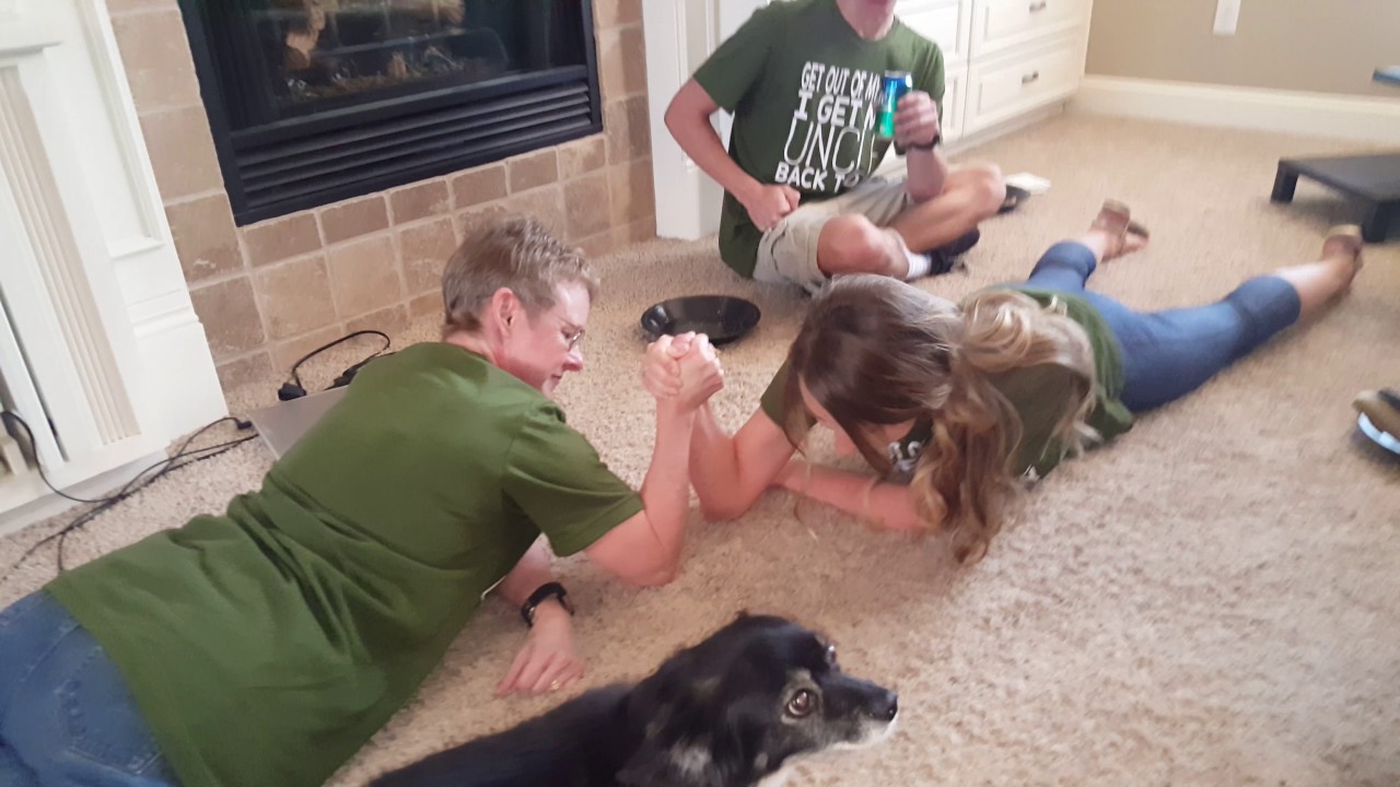 Becky puts Jessica down in arm wrestling