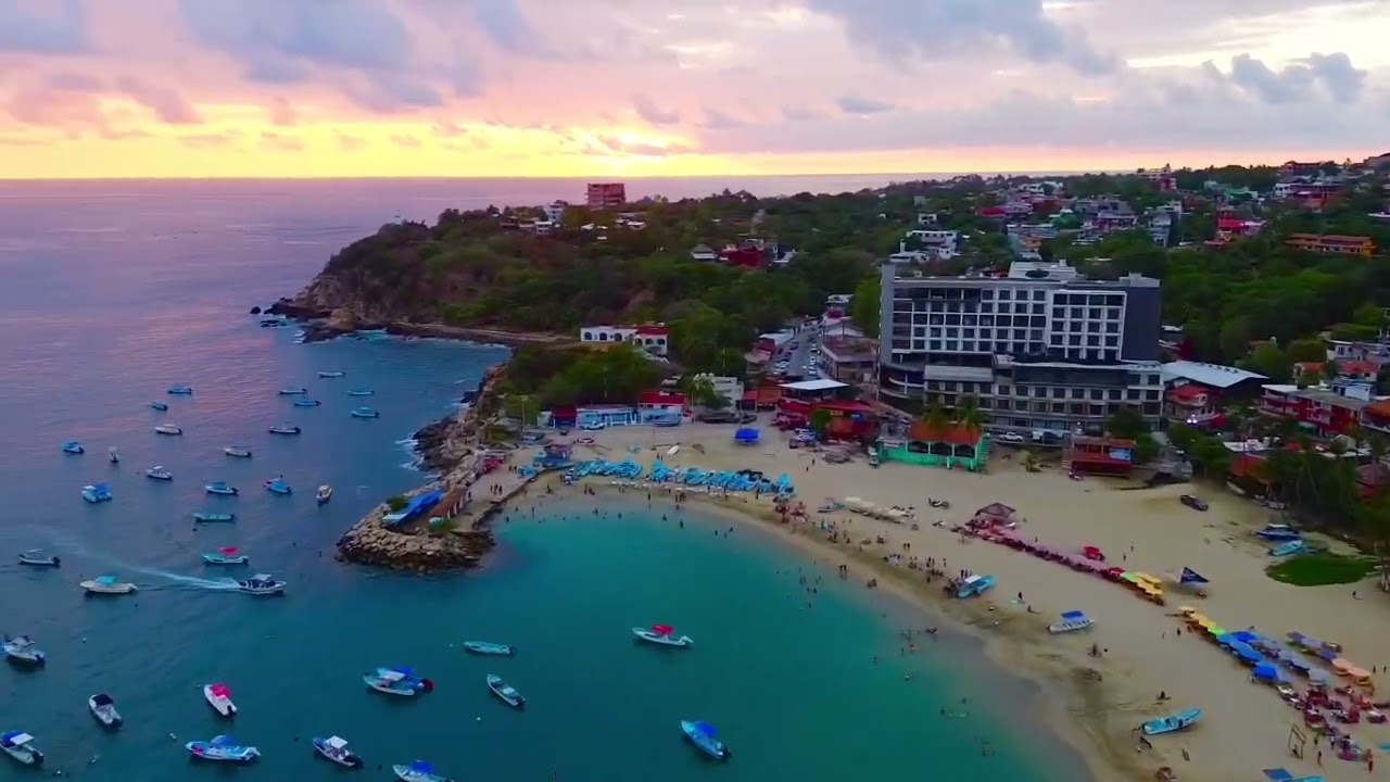 Punta Zicatela to Playa Principal at sunset. Puerto Escondido Mexico. Mexican tours.