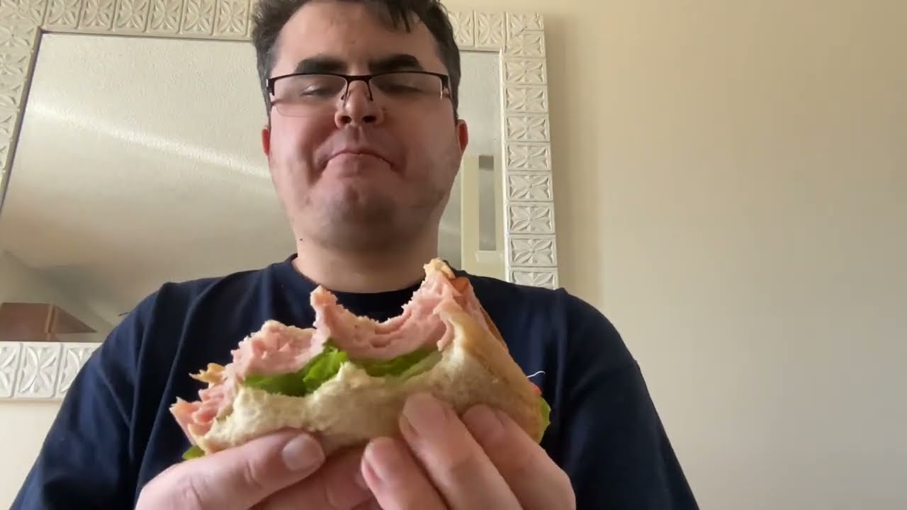 Watch me eat a ham and Swiss sandwich