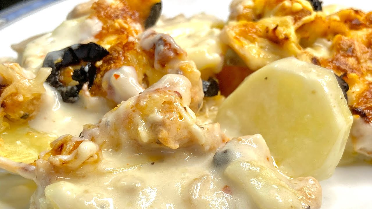 Baked Chicken and Potatoes with White Sauce and Mozzarella Cheese