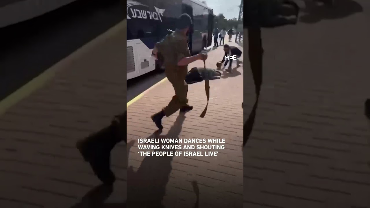 Israeli woman dances while waving knives and shouting &lsquo;the people of Israel live&rsquo;