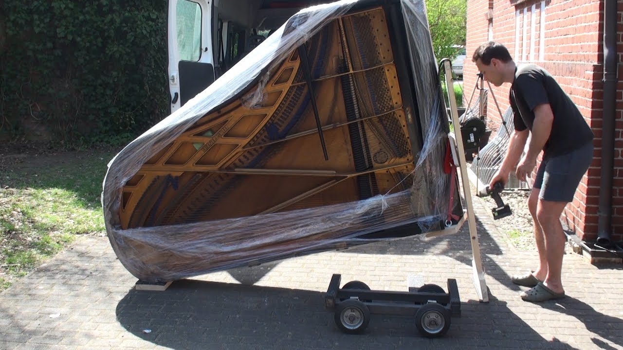 Piano Lifter - lifting a concert grand piano with cordless drill - piano transport