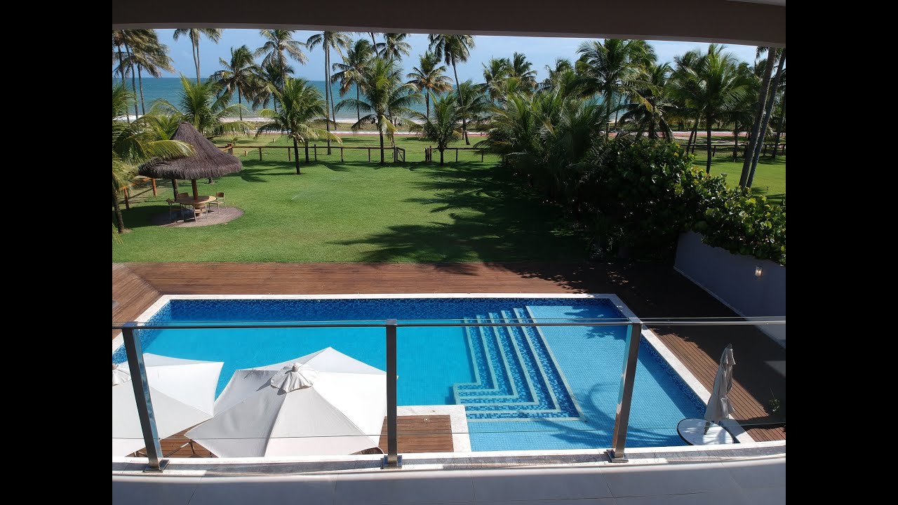 Casa Taurus; à beira mar, composta por 7 suítes e mais 1 de serviço, todas c/ ar-condicionado