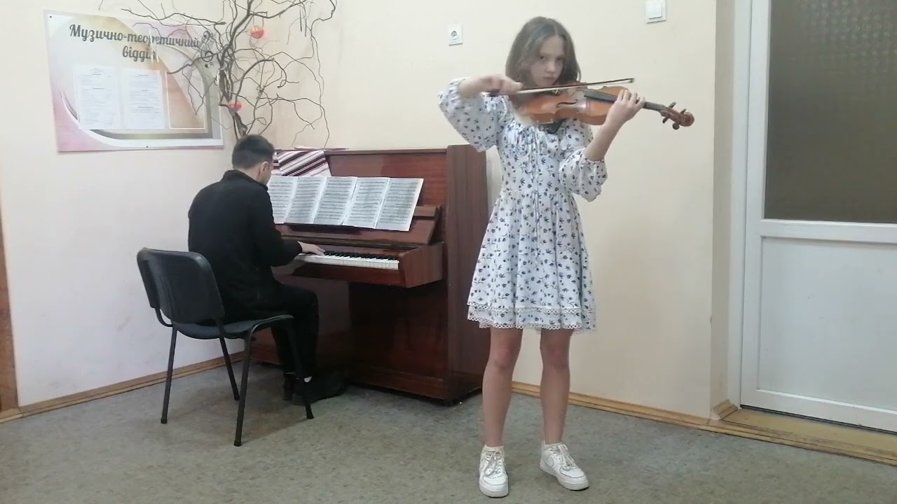 В. Гомоляка  