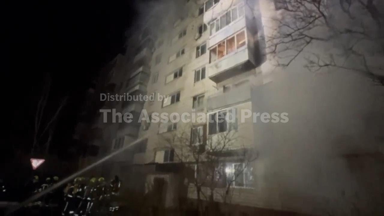 Firefighters tackle blaze at residential building after drone attack on Kyiv region