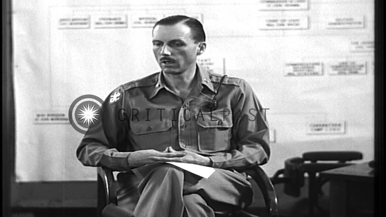 Major Tisdell talks about American surrender to the Japanese in 1942 during the t...HD Stock Footage