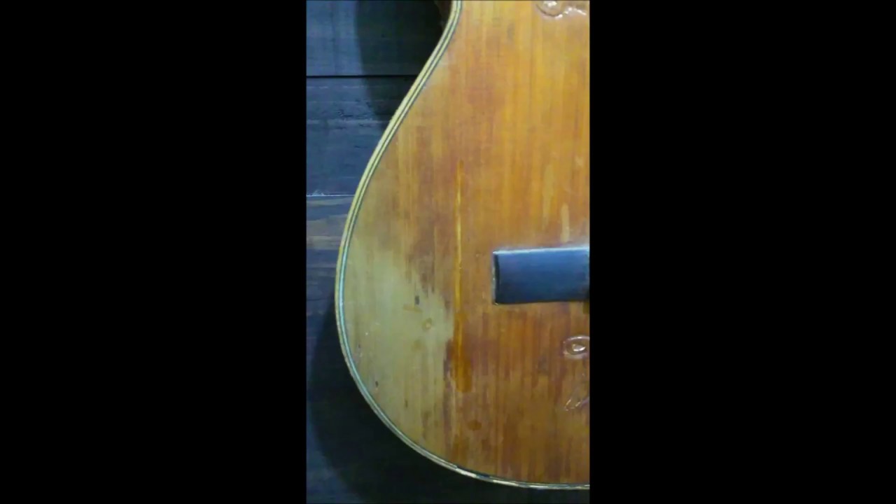 Luthier. Restauración de guitarra. Cambio de tapa armonica