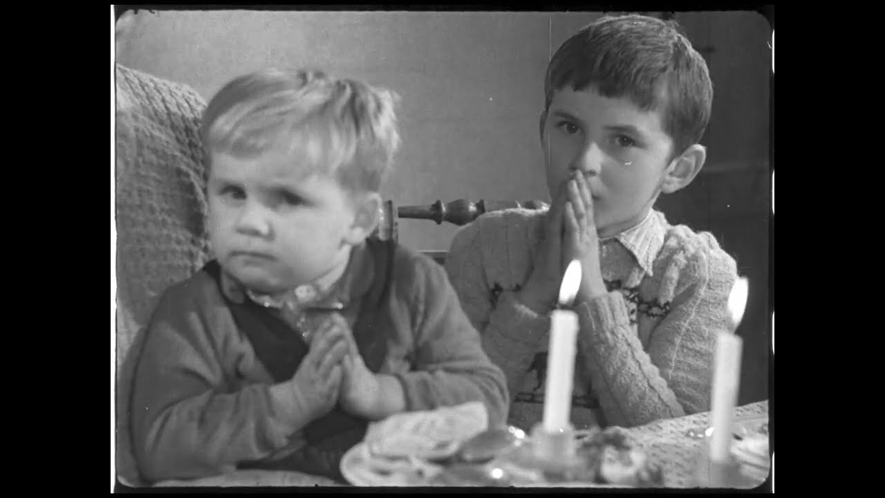 Slovakian Catholic family prays Grace before Christmas meal (1949, HD, 🔇)