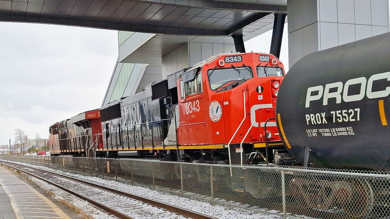 A Canadian National Mixed Freight Train Zips through Cobourg - CN Westbound