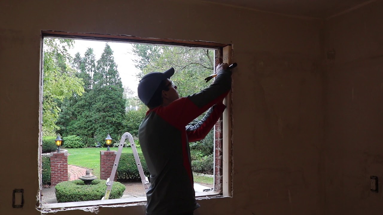Window Installation In Brick Stick Framed House
