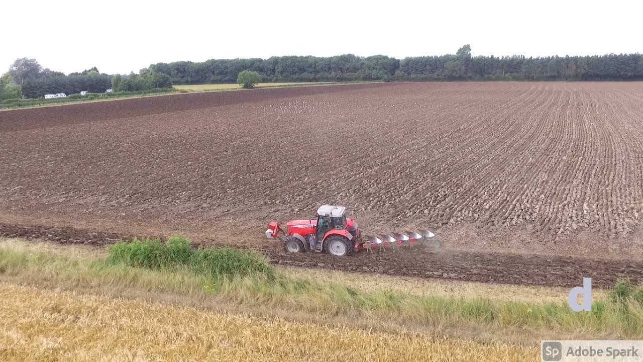 Massey Ferguson  6480 in tough going and harvest 21 begins.