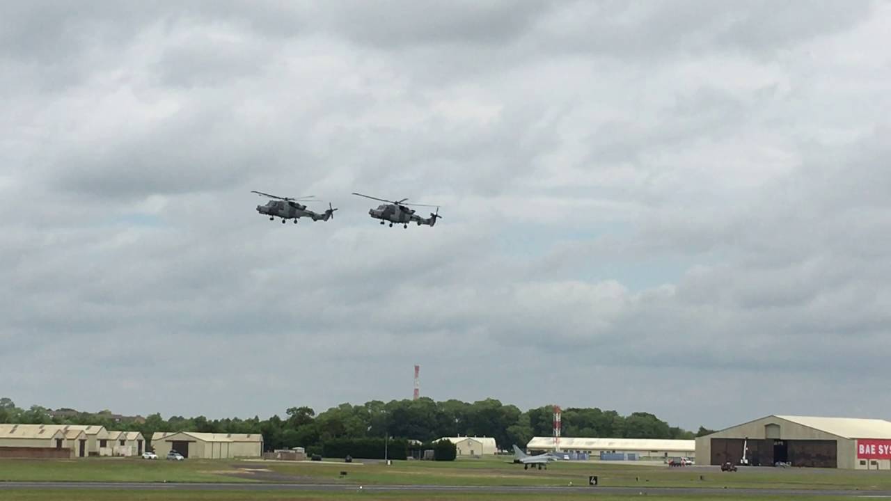 Wildcat HMA2 Helicopters Flying Backwards in Formation