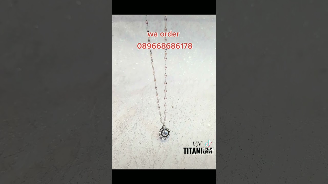 aksesoris kalung titanium mata satu simpel