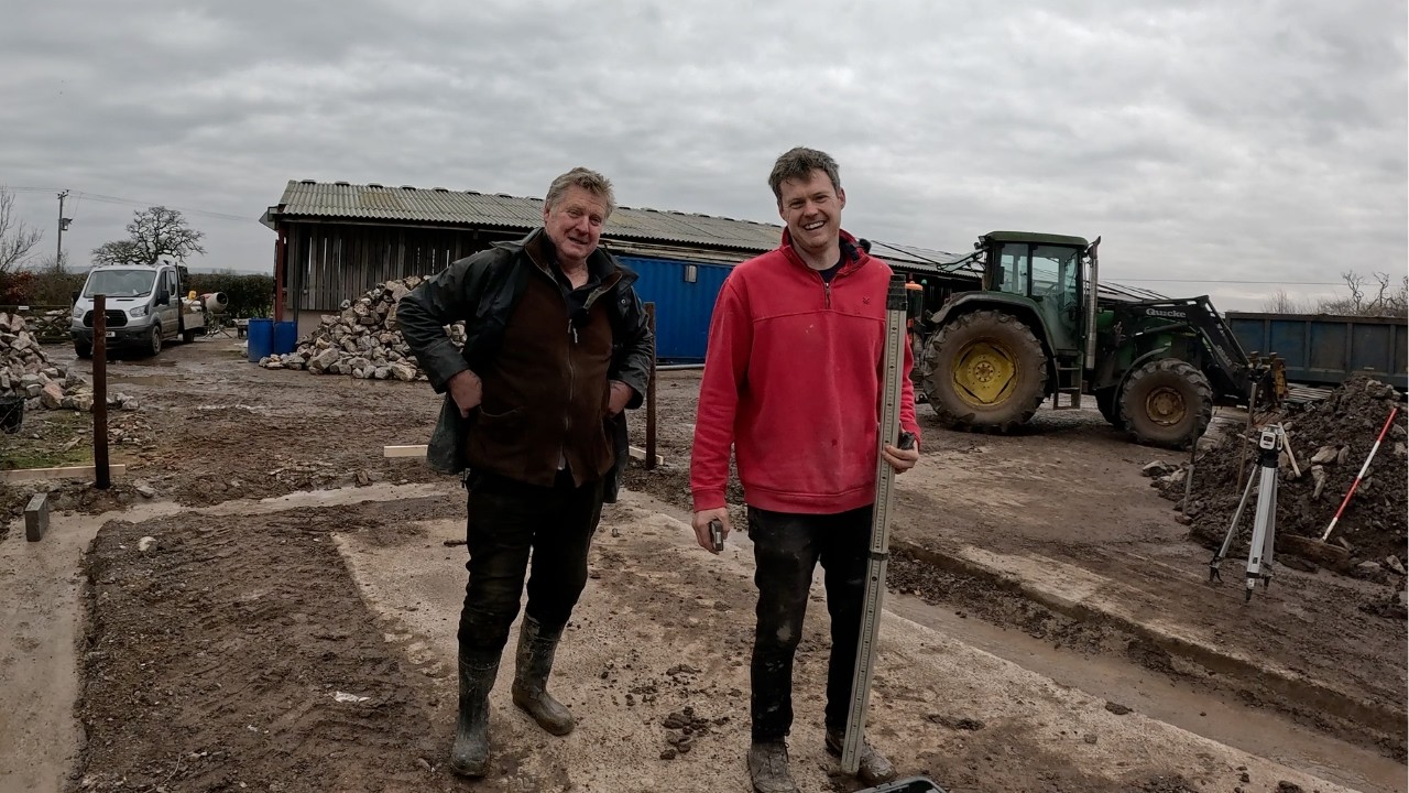 FATHER AND SON BUILDING THE FARM GARAGE OVER SITE!