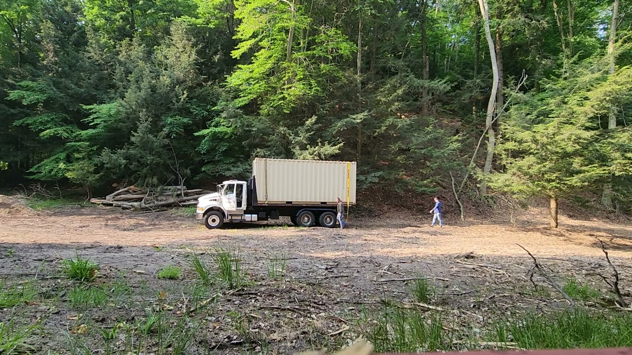 dumping a shipping container with the sterling hooklift!!